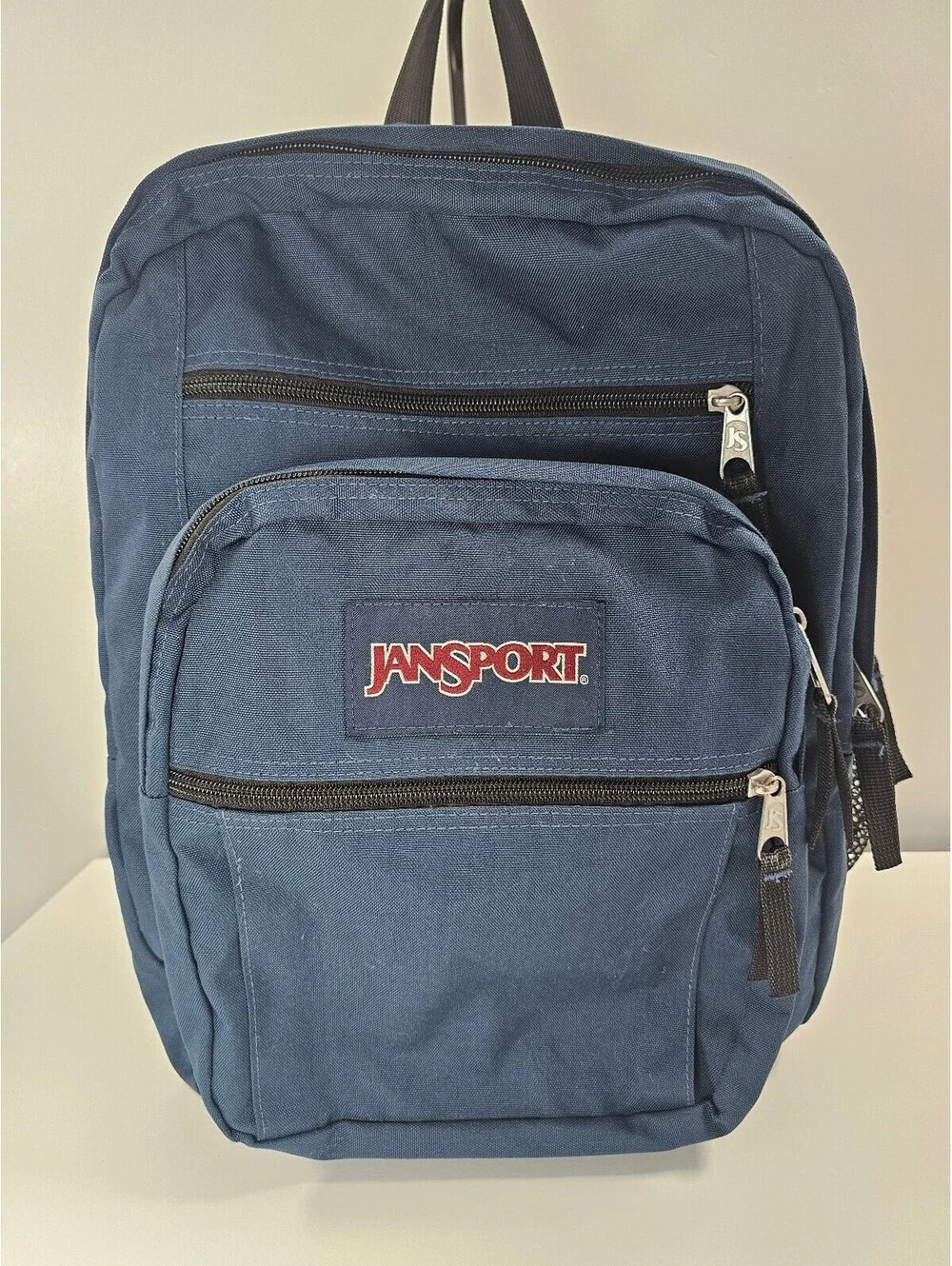 JanSport Classic Navy Blue Backpack with Multiple Compartments